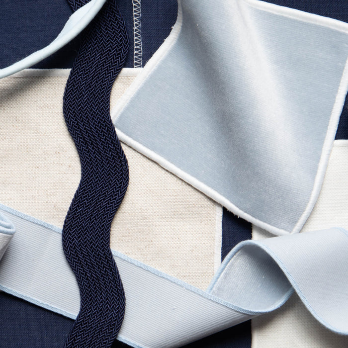 Midnight fabric swatches and trims in navy and light blue tones, made-to-order with short lead times and crafted in the USA
