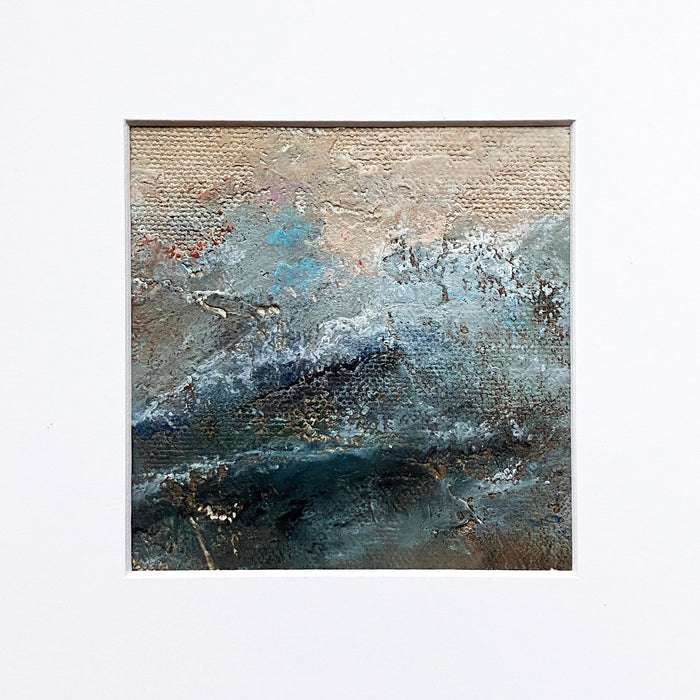 The artwork 'MOMENTUM IV' by Xanthippe Tsalimi features a textured abstract landscape in oil on canvas, showcasing dramatic stormy teal waves beneath a warm beige sky. The painting exhibits heavy impasto technique with layers of deep turquoise and silvery gray tones, creating a dynamic coastal atmosphere with rich textural elements and moody environmental undertones.