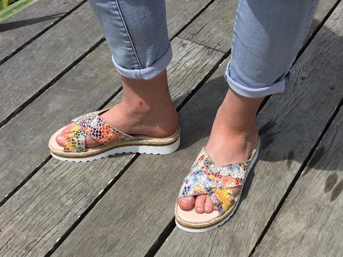Aerobics are quality European women's sandals and slides. Soft leather with crossover detail in camel. Espadrille detail around the sole unit.