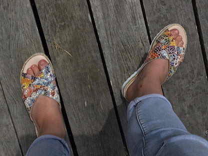Aerobics are quality European women's sandals and slides. Soft leather with crossover detail in camel. Espadrille detail around the sole unit.