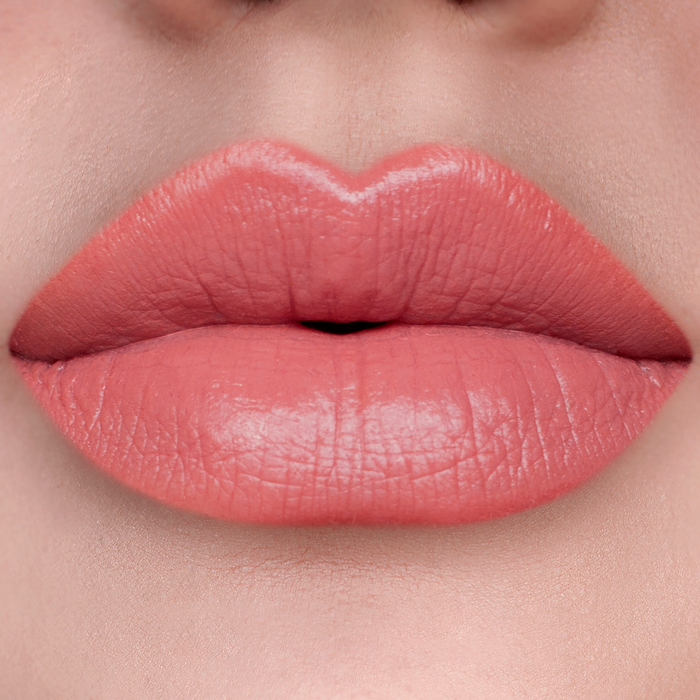 Best Life rosy nude lipstick on lips, light skin tone