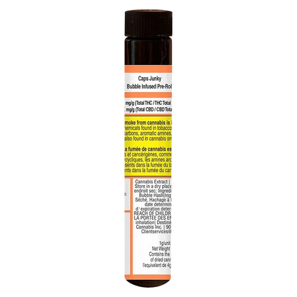 Tall front view of a dark brown tube labeled Caps Junky Bubble Infused PR 1 x 1g with a white, orange and yellow warning label wrapping the cylinder.