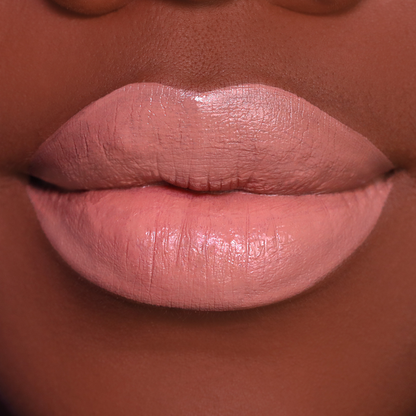 Caramel nude brown lipstick on lips, medium-deep skin tone