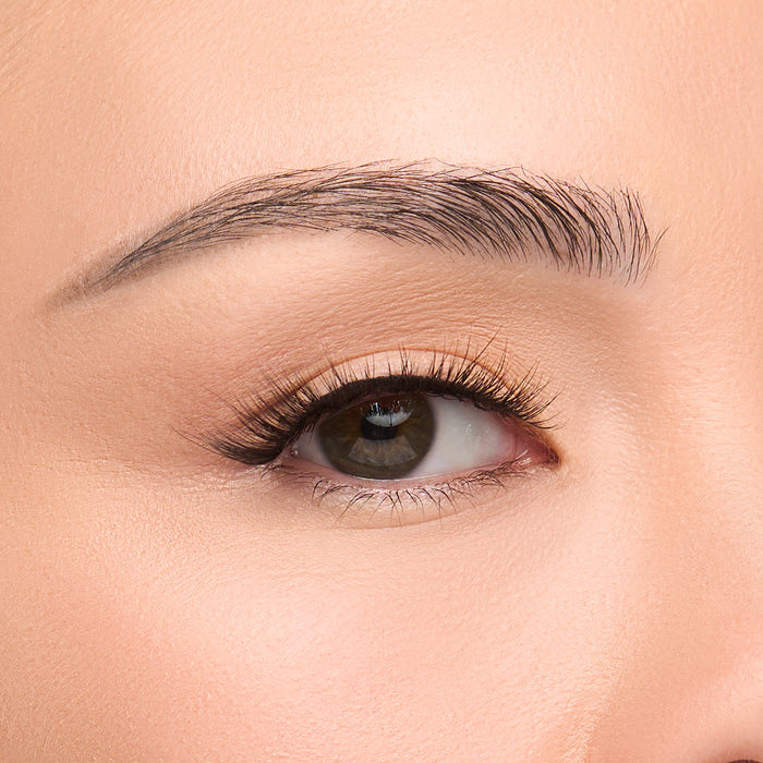 Cat Walk a flared, wispy lash with extra-long length and bold volume shown on an eye.