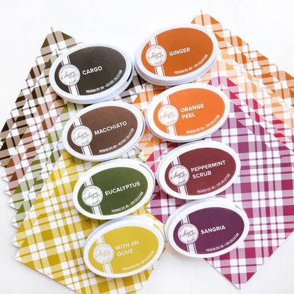 Catherine Pooler - Patterned Paper - Fall Plaid. We put together the Fall Plaid Patterned Paper pack for those occasions! This fall color combo was specially chosen to give that traditional feel of the changing leaves in the season! Available at Embellish Away located in Bowmanville Ontario Canada.