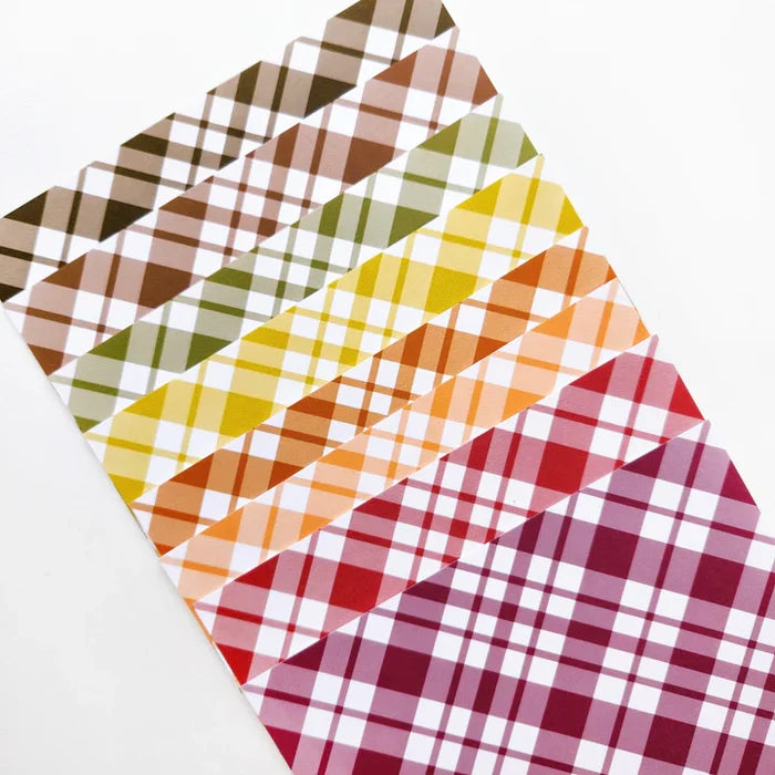 Catherine Pooler - Patterned Paper - Fall Plaid. We put together the Fall Plaid Patterned Paper pack for those occasions! This fall color combo was specially chosen to give that traditional feel of the changing leaves in the season! Available at Embellish Away located in Bowmanville Ontario Canada.