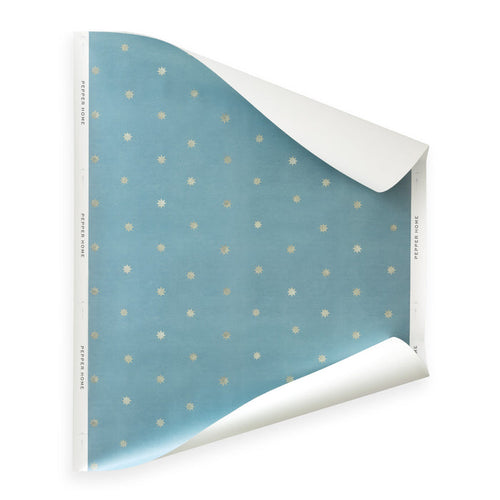 Charlie Harbor blue wallpaper sample with tiny gold starbursts, made to order in the USA with short lead times
