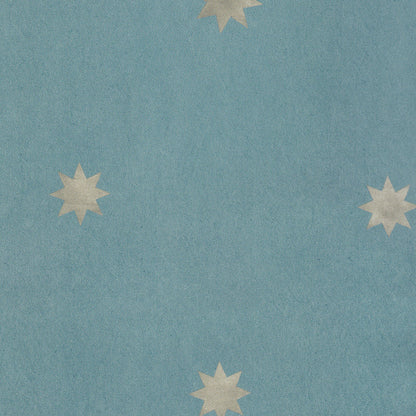 Charlie Harbor blue wallpaper with scattered starburst motifs made to order in the USA with short lead times