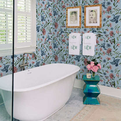 Bathroom featuring Daphne Powder wallpaper with birds and florals on blue, made-to-order in the USA with quick lead times