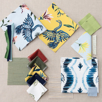 Daphne Powder fabric swatches with bird and floral prints in blue, yellow, and green hues, made-to-order in the USA with quick lead times