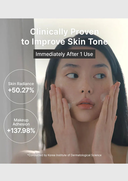 Woman applying skincare product with text claiming clinical improvements in skin tone and makeup adhesion.