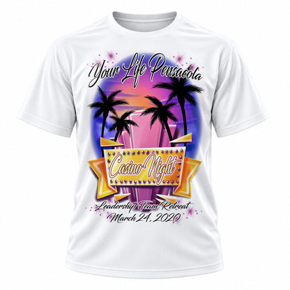Personalized Casino Beach Scene T-Shirt, front-view T-shirt mockup featuring custom Air-Volution artwork by Mythic Airbrush