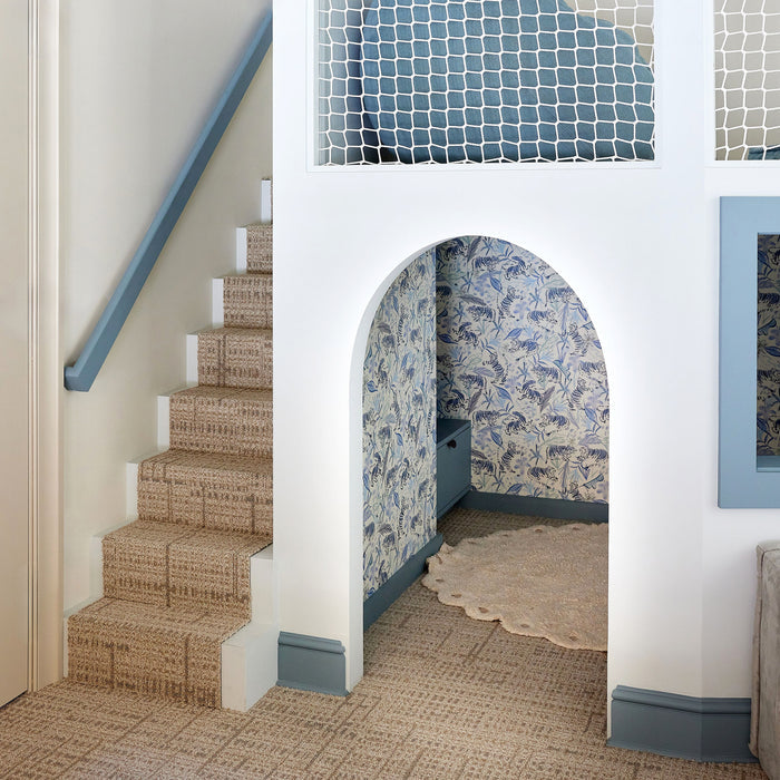 Cozy play nook with Frida Blue wallpaper in blue botanical print, made-to-order with short lead times, USA manufactured