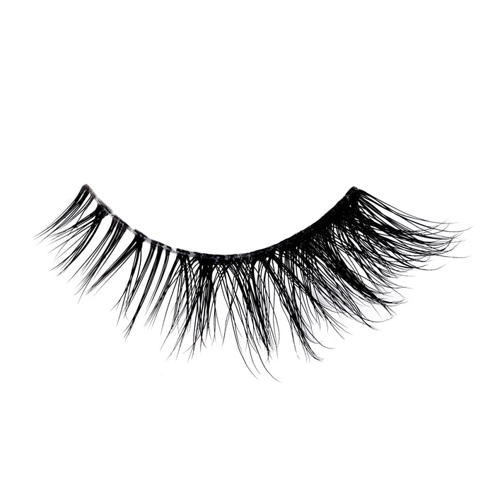 Frisky false lash with natural inner corners transition into flared wispy outer corners.