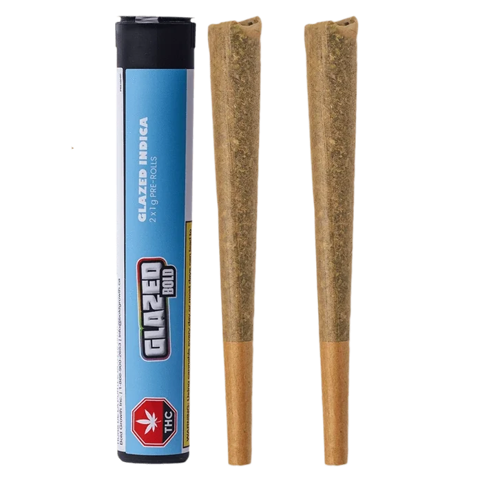 Product-shot front view of the Glazed Indica PR 2 x 1 g tube standing beside two cone-shaped pre-rolls on a white background.