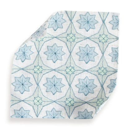 Hayes Sea Salt fabric swatch with geometric blue floral pattern, perfect for custom curtains by Pepper Home.