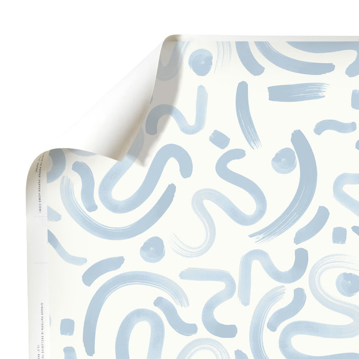 Hockney Sky made-to-order wallpaper with light blue abstract brushstrokes, manufactured in the USA with short lead times