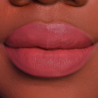 Just Right rosewood lipstick on lips, medium-deep skin tone