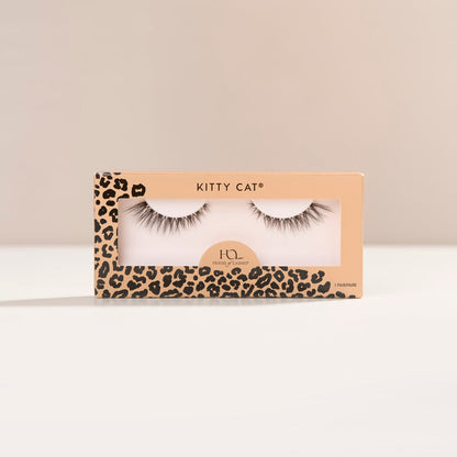Kitty Cat false lashes features a natural flair for a subtle cat-eye effect, with wispy fibers, natural volume, and a short length.