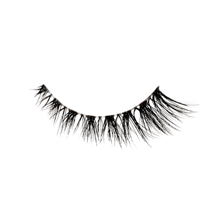 Kitty Cat false lashes features a natural flair for a subtle cat-eye effect, with wispy fibers, natural volume, and a short length.