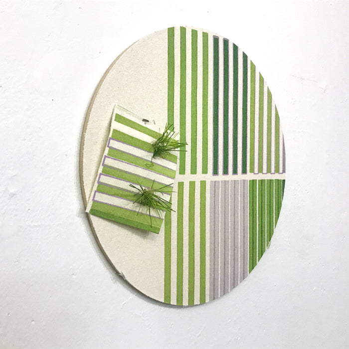 The artwork 'Line Study 4' by Molly Koehn features a circular composition with bold vertical green stripes arranged in gradient patterns. The piece incorporates textural astroturf elements on raw silk, mounted on birch with a cream-colored background. Geometric segments create a modern, minimalist design with varying shades of green and grey lines.