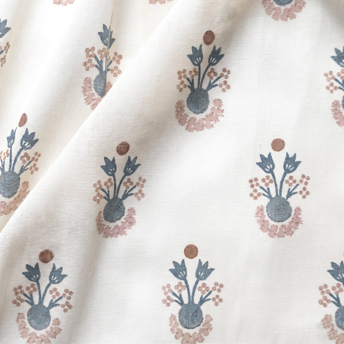 Lucie Harbor fabric featuring soft blue and muted rust floral motifs on sheer cream cotton, made-to-order, USA quality craftsmanship