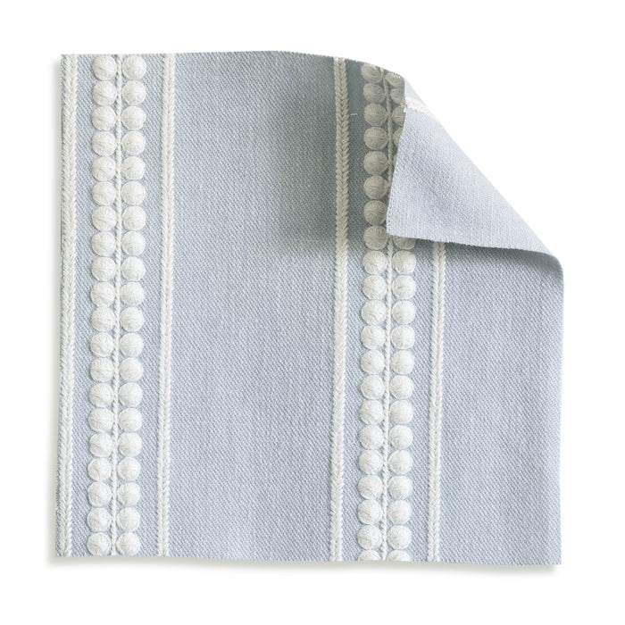 Margot Mist Embroidered Curtain, mist blue swatch with pom pom trim, made to order in USA with short lead times