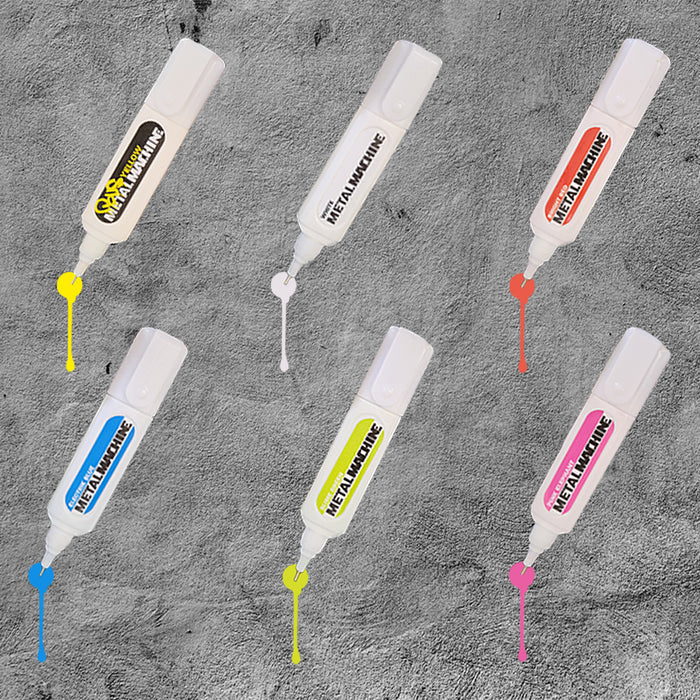 6 muticolored metal tipped markers labeled Metal Machine