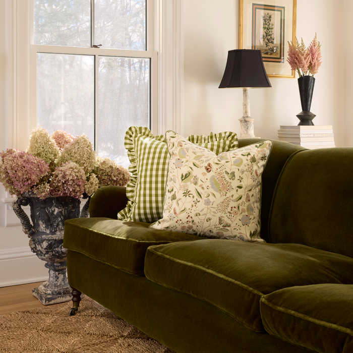 Gemma Rose floral throw pillow on a velvet sofa, made to order in the USA with short lead times