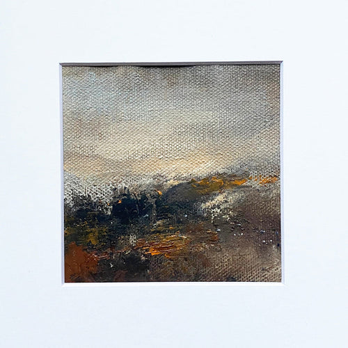 The artwork 'MOMENTUM I' by Xanthippe Tsalimi features an abstract landscape in oil on canvas, depicting a misty horizon with earthy browns and rustic oranges blending into cool greys and creamy whites. The textured brushstrokes create a dynamic, atmospheric composition suggesting a moody terrain or stormy skyscape, with rich impasto technique visible in the 8x8 inch painting.