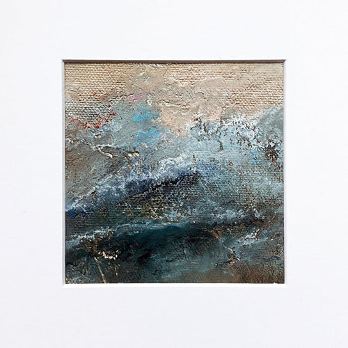 The artwork 'MOMENTUM IV' by Xanthippe Tsalimi features a textured abstract landscape in oil on canvas, showcasing dramatic stormy teal waves beneath a warm beige sky. The painting exhibits heavy impasto technique with layers of deep turquoise and silvery gray tones, creating a dynamic coastal atmosphere with rich textural elements and moody environmental undertones.