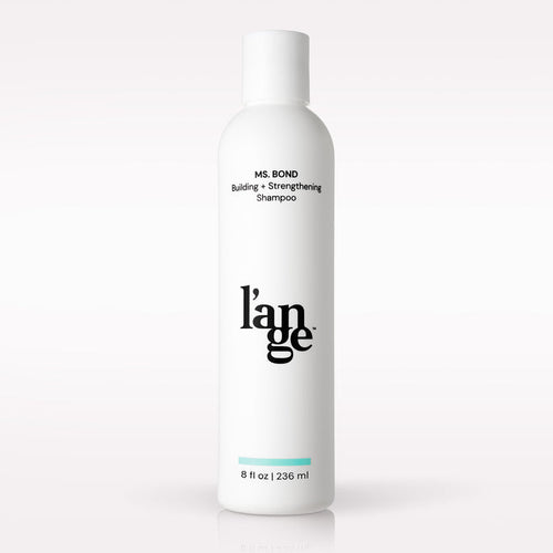 L’ange Ms. Bond Building + Strengthening Shampoo on a blank background