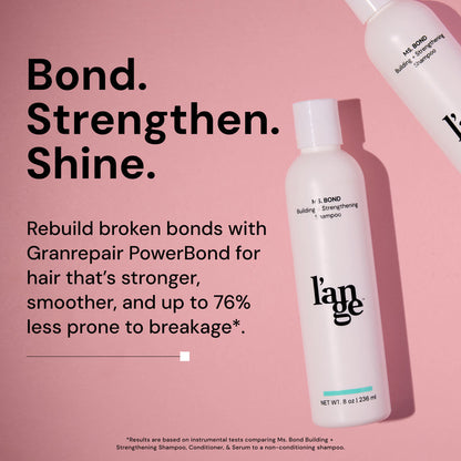 Ms. Bond Building + Strengthening Shampoo with Granrepair PowerBond, promising stronger, smoother hair and up to 76% less breakage, displayed against a pink background.