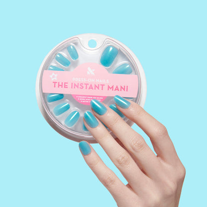 My Little Seapony | Round | Short turquoise iridescent press-on nails in a short round shape for easy at-home mani
