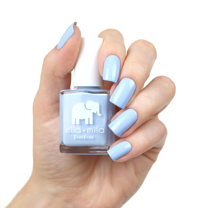 My Rain-beau Cinderella blue nail polish manicure on a light skin tone with the bottle