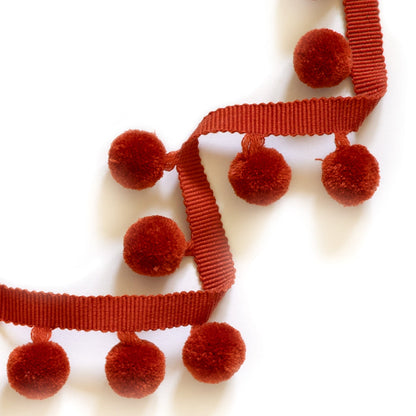 Nutmeg pom pom trim by Pepper Home adds a soft, sweet touch to custom curtains and cozy spaces.