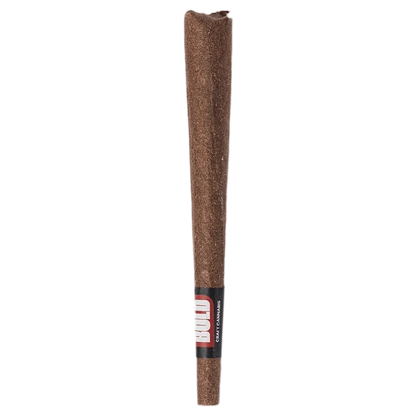 Straight-on view of an upright Orange Crush Blunt 1 x 1 g, a brown cone-shaped pre-roll with a small black-and-red label near the base