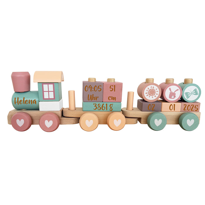 Rosa-pinker Holzzug aus Holz als personalisiertes Geburtsgeschenk