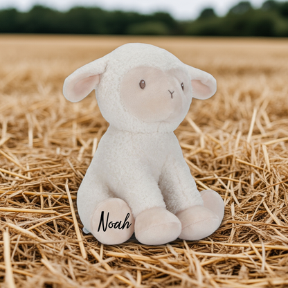 Detailansicht eines weichen Schaf-Kuscheltieres mit Name