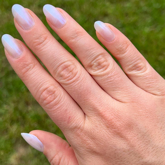 Pink Goldfish | Oval | Medium pearly light pink iridescent press on nails in medium oval shape for easy at-home mani