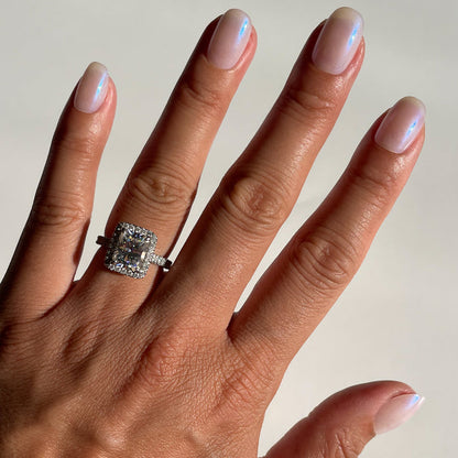Pink Goldfish | Round | Extra Short shimmery pink iridescent press on nails in extra short round shape on hand with ring