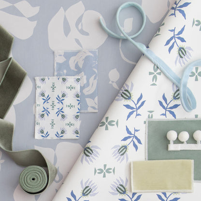 Powder made-to-order fabric with soft blue floral and leaf patterns, crafted in the USA with quick turnaround times