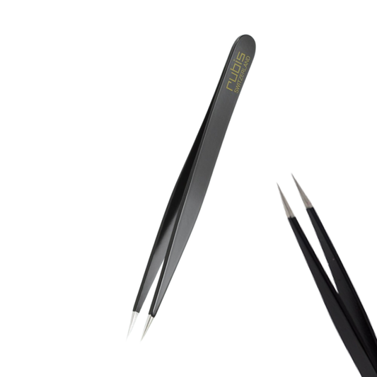 T110 Rubis Black Sharp Point Brow Tweezer |Two pairs of precision tweezers on a plain white background, with one pair angled diagonally and the other partially visible on the right. The tweezers have black handles with gold 'Rubis' branding and silver metal tips.