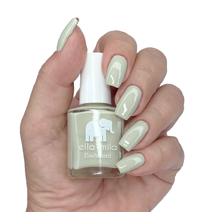 Sacred Sage dusty miller green nail polish manicure on a light skin tone with the bottle
