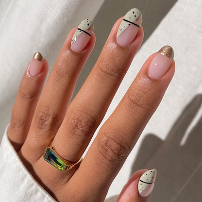 Sacred Sage sage green outline French tip nail art on a medium skin tone with a ring