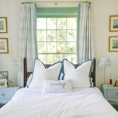Sky fabric pillows with blue edge trim, made-to-order in the USA, featuring fast turnaround and quality craftsmanship