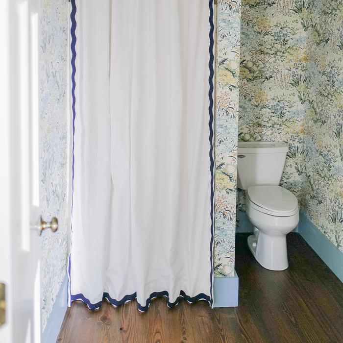 Snow shower curtain in crisp white with decorative navy trim, custom made-to-order, quick turnaround, crafted in the USA quality.