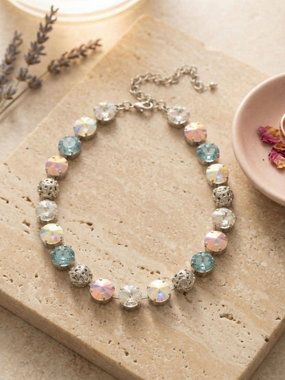 Sorrelli Clementine Tennis Necklace with Rainbow Quartz crystals and filigree spheres in a palladium-tone finish