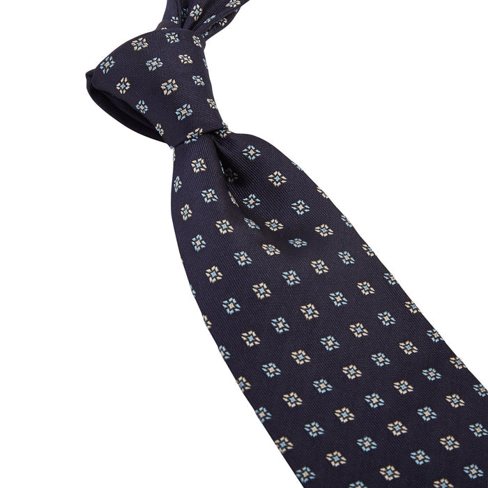 A handmade Sovereign Grade Midnight Blue Square Floral Jacquard Tie - KirbyAllison.com.