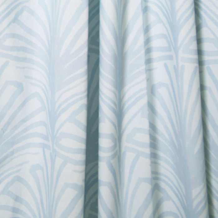 Suzy Sky curtain with soft blue palm leaf pattern on cotton, made-to-order with quick turnaround, crafted in USA quality.